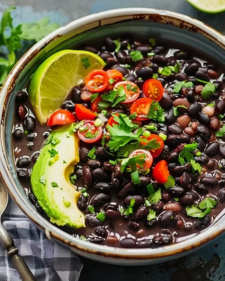 Instant Pot Cuban Black Beans cooking in a pressure cooker